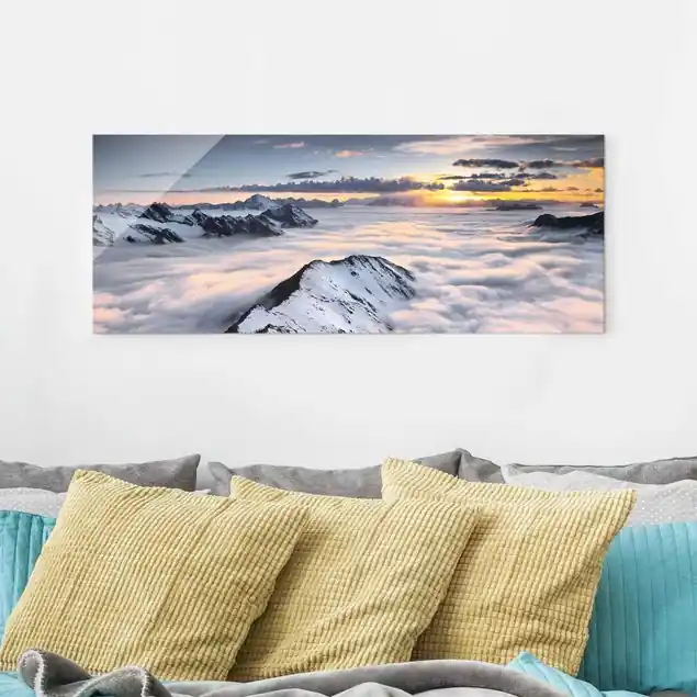 Jetzt Kaufen Blick über Wolken und Berge Glasbild - Panorama