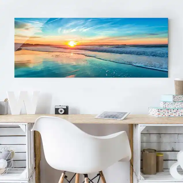 Romantischer Sonnenuntergang am Meer Glasbild - Panorama Beliebt
